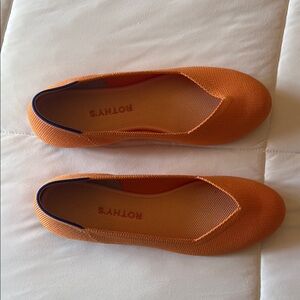 Rothy’s ballet flats tangerine
